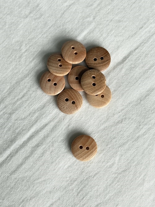 Lille glat træknap med 2 huller - 12 mm